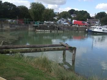 Supply and fit new poles for an existing jetty in the River Ouse which had rotted away 