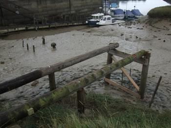Supply and fit new poles for an existing jetty in the River Ouse which had rotted away 